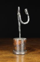 A Late 18th Century Wrought Iron Rushnip with a candle socket to the upswept arm counter-weighting