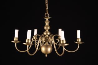 Three Brass Dutch Style Chandeliers: The largest having eight crested S-scroll arms bearing