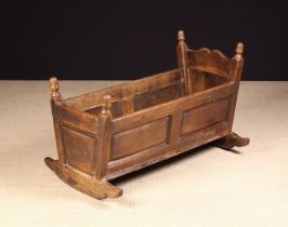 An 18th Century Scottish Joined Oak Cradle.