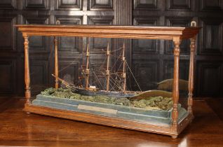 A Rare 19th Century Musical Automaton Diorama: The model three-masted sailing vessel activated by