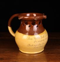 An Isaac Button Soil Hill Slipware Puzzle Jug with five protuberant spouts to the rim,