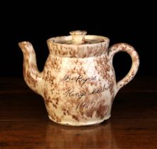 A Wetheriggs Teapot decorated with speckled brown glaze sponged onto a cream slip ground and