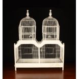 A Vintage White Painted Wire & Wood Twin-domed Bird Cage 34" (86 cm) high,