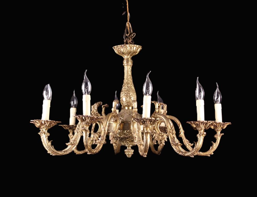 A Vintage Cast Gilt Metal Chandelier with ten foliate crested S-scroll branches bearing electric