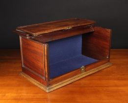 A 19th Century Mahogany Box having a hinged lid to the top incorporating the lift up panel front,