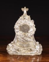A Exhibition Silver Electrotype Mantel Clock in an highly decorative figural case designed by John