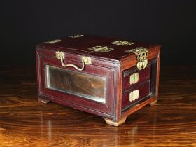 A Small Oriental Hardwood Vanity Box with pierced metal mounts,