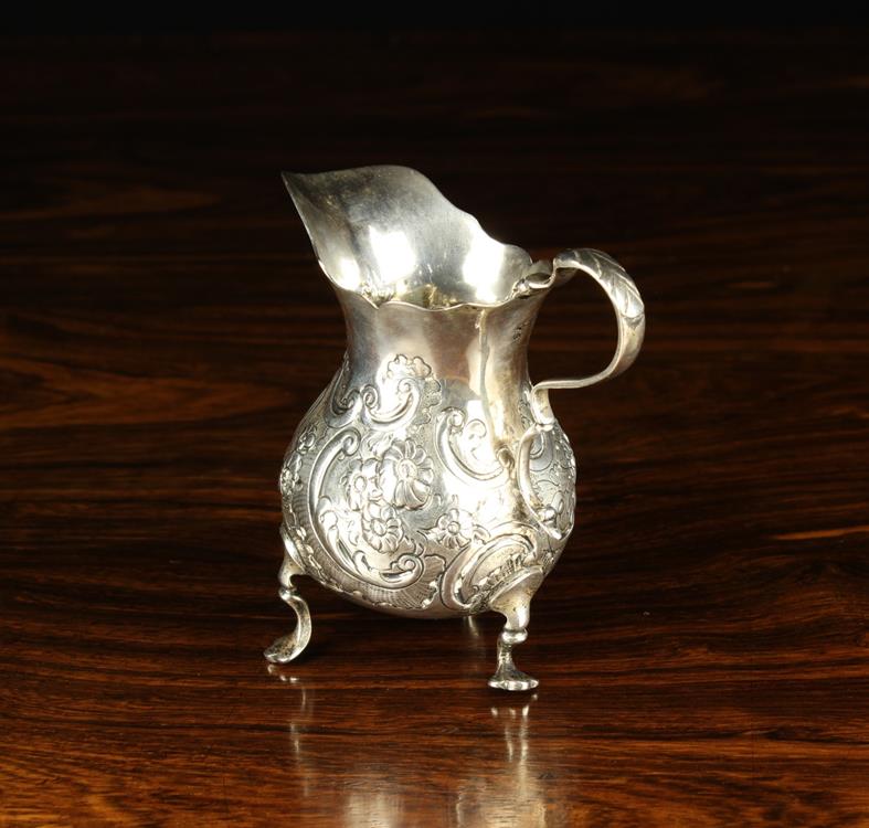 A Small Victorian Silver Jug with London hallmarks for 1876, - Image 2 of 3