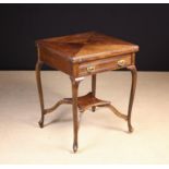 An Edwardian Walnut Envelope-top Card Table.