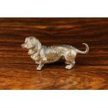 A Miniature Austrian Cold Painted Bronze Cold Painted Bronze Dachshund Dog, 2¾" (7 cm) in length.
