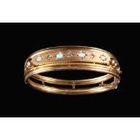 A Fine Nine Carat Gold Bracelet set with four opals alternated with diamonds and housed in a case
