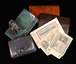 Four Leather Wallets; two with silver mounts,