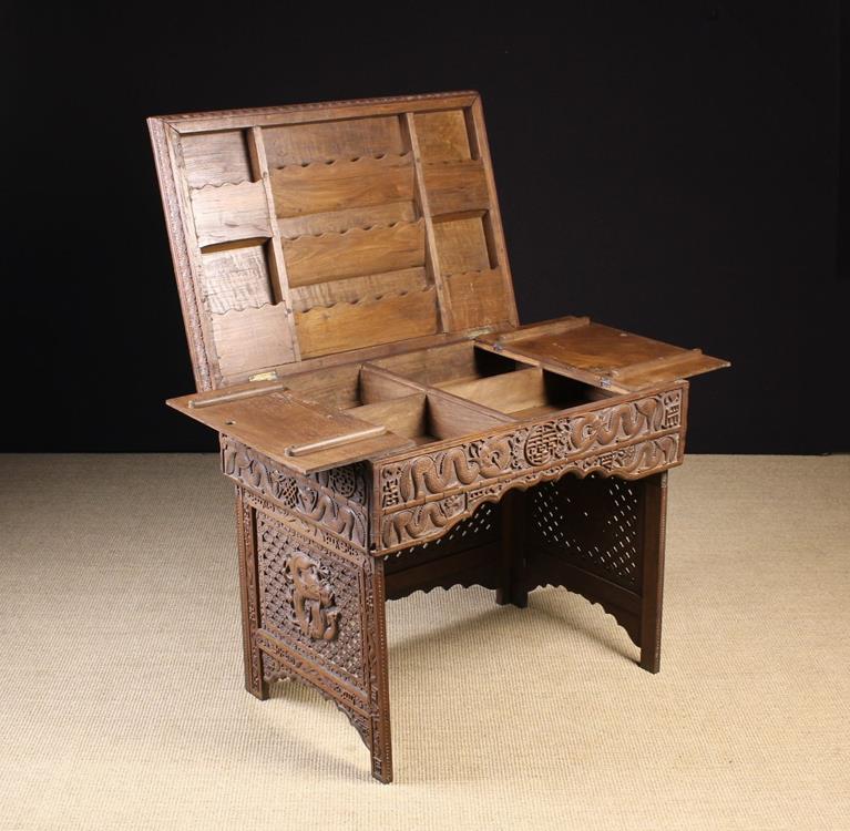 A Late 19th/ Early 20th Century Chinese Carved Hardwood Folding Travelling Scribes Desk. - Image 2 of 2