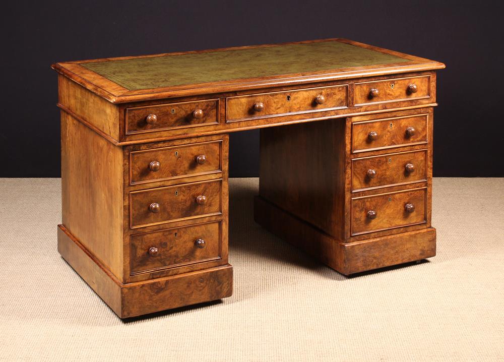 A Fine Victorian Figured Walnut Pedestal Desk.