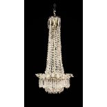 A Cut Crystal Five Light 'Tent' Chandelier with long strands of facetted beads cascading down to an