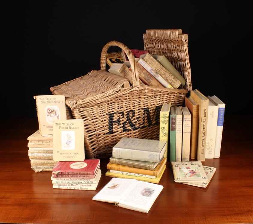 A Fortnum & Mason's Wicker Twin-lidded Basket containing a Group of Vintage Books,