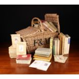 A Fortnum & Mason's Wicker Twin-lidded Basket containing a Group of Vintage Books,