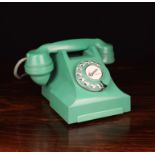 A Vintage Vibrant Green Bakelite Telephone, British GPO 300 series , the handset stamped P&T 606.