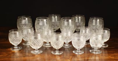 A Group of Six Large 5¾" (14.5 cm) & Ten Smaller 4" (10 cm) high Cut Crystal Brandy Glasses.
