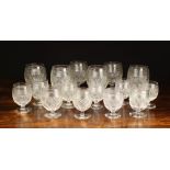 A Group of Six Large 5¾" (14.5 cm) & Ten Smaller 4" (10 cm) high Cut Crystal Brandy Glasses.