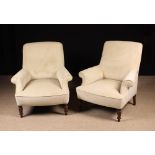 A Pair of Victorian Style Upholstered Armchairs covered in cream suede effect fabric edged with