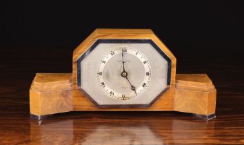 A Vintage Art Deco Walnut-cased Mantel Clock; an Elliot Clock with W.