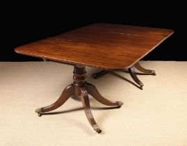 A Regency Mahogany Twin Pedestal Dining Table.
