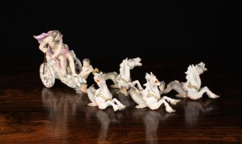 A Continental Meissen Style Porcelain Figure Group of Neptune swathed in a windswept pink drape,