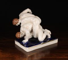 A Royal Dux Figure Group of Two Nude Wrestlers, impressed 2788 to the base, 8½" (22 cm) high,