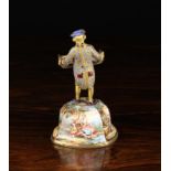 A 19th Century Viennese Enamel & Gilt Metal Figure of a Courtier wearing a champleve enameled