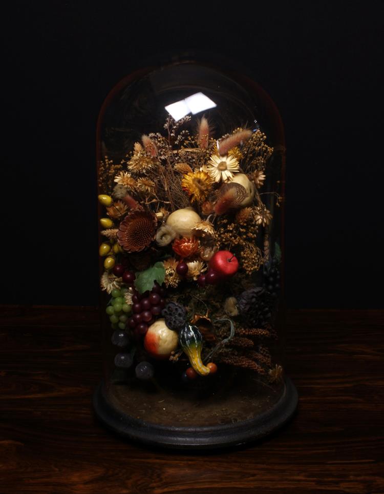 An Arrangement of Dried Flowers and Artificial Fruit displayed beneath a Victorian glass dome with - Image 2 of 2