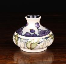 A Moorcroft Vase Circa 2001 of squat bulbous form,