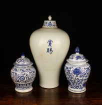 Three 20th Century Chinese Style Blue & White Jars: A large Meiping vase with added lid,