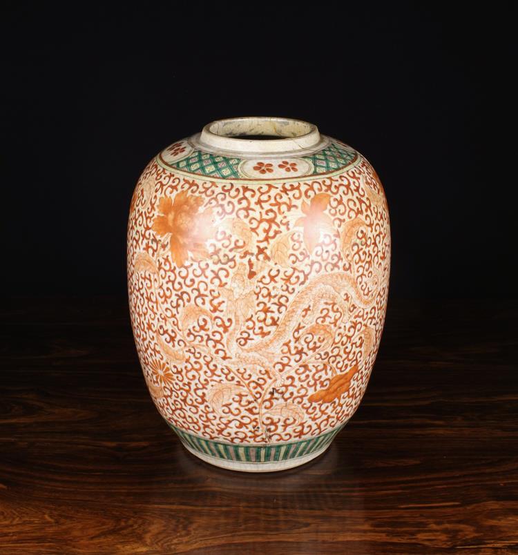 A Large Ovoid Ginger Jar (A/F lacking lid) decorated with ironstone red scrolling salamanders