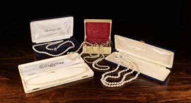 Eight Simulated Pearl Necklaces: A twin strand necklace with diamonté clasp in a case marked