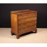 A Late Georgian Flame Mahogany Chest of Drawers with brushing slide.