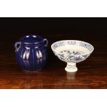 A Chinese Blue & White Stem Cup decorated with two fenghuang amongst scrolling cloud forms to the