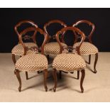 Five Victorian Carved Walnut Balloon Back Chairs with refurbished upholstered seats.