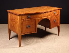 An Edwardian Serpentine Front Satinwood Sideboard/Dressing Table bordered with diagonally grained