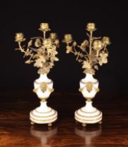 A Pair of Louis XVI Style White Marble & Gilt Metal Five Light Candelabra.