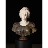 A Bicolour Marble Bust of a Lady carved from white marble with a lattice head-dress,