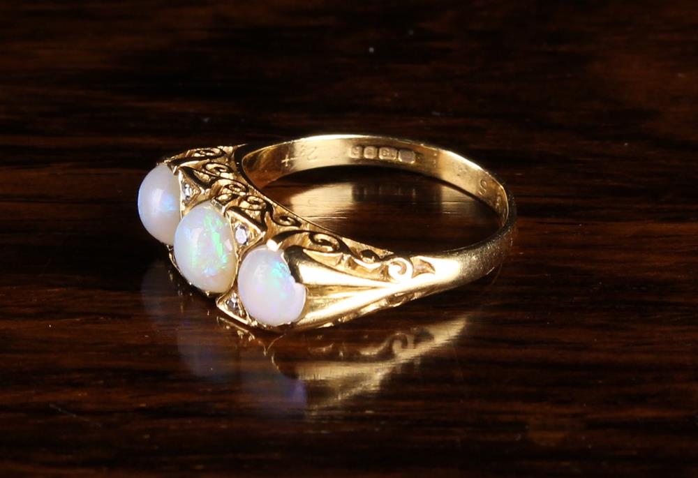 An 18 Carat Gold & Opal Ring set with three cabochon stones. UK size O/P, US 7.5. - Image 3 of 3