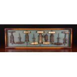 A Cased Collection of Nine Antique Corkscrews to include four "Kings" Pattern,