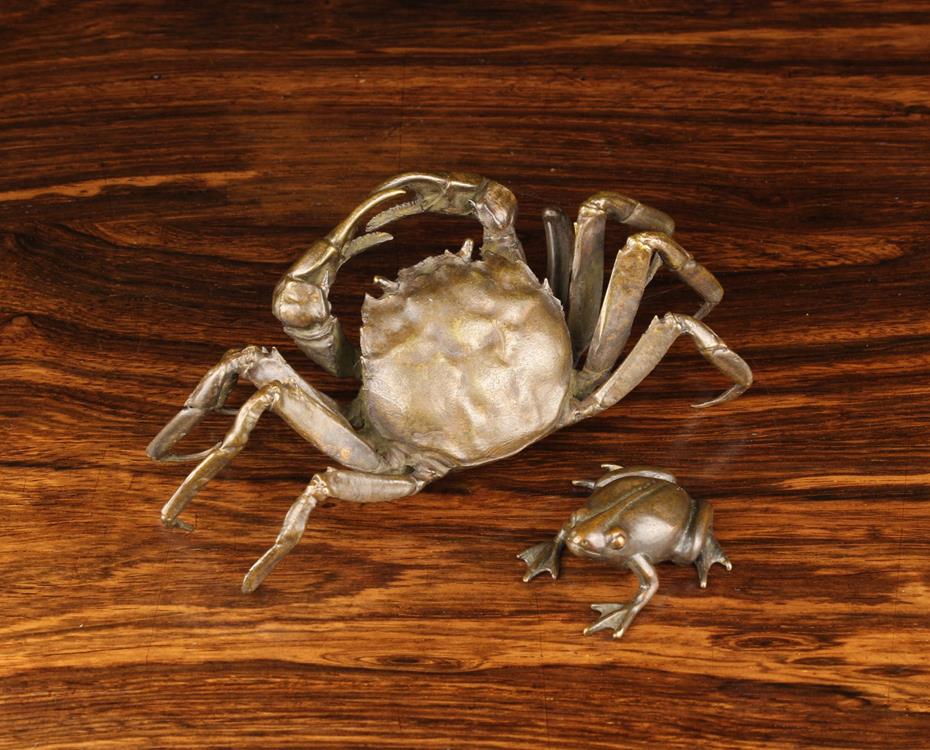 A Cast Bronze Crab, 2" (5 cm) high, 6" (15 cm) in width, 3" (7.