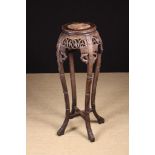 A Late 19th/Early 20th Century Chinese Carved Hardwood Jardiniere Stand.