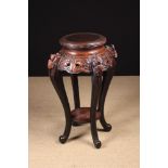 A Vintage Chinese Carved Hardwood Jardiniere Stand.