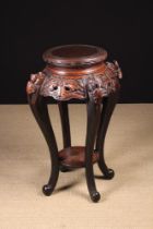 A Vintage Chinese Carved Hardwood Jardiniere Stand.