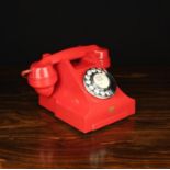 A Vintage British GPO 300 Series Red Bakelite Telephone, the handset moulded PAT.