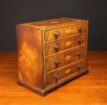 A Small Late 19th Century Inlaid Mahogany Apprentice Piece: A Chest of Drawers having four long