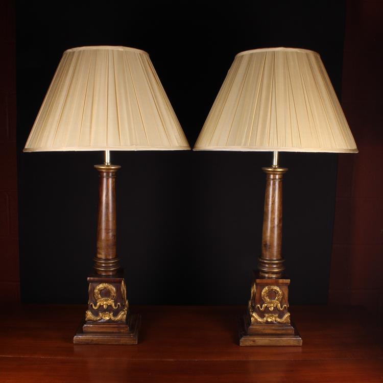 A Pair of Large Turned Walnut Columnar Side Lamps on square plinth bases ornamented with carved &